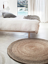 Braided Dandelion weave hemp rug showing natural tones and pewter border.
