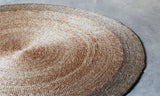 Close-up of intricate coiled hemp texture with natural and pewter tone border.