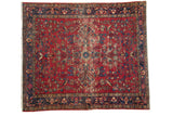 Vintage Lilihan rug, cherry red floral medallion field, navy border. 5'3