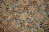 Antique Mahal carpet's rare green ground, allover Veramin floral pattern, and textured border.