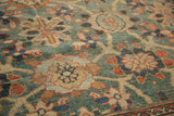 Textured pile of antique Mahal carpet showing Veramin design on rare green ground.