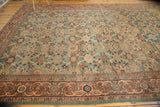 Antique Mahal border detail, rich madder root red, terra cotta, blue, and ivory stylized motifs.