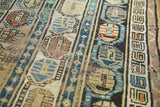 Antique Caucasian runner's triple column boteh motif in blue, orange, ivory, with low pile.