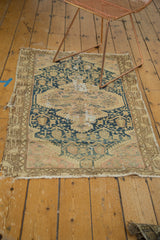 Aged fringe and intricate serrated spandrel motif on the vintage Tajabad rug's bottom corner.