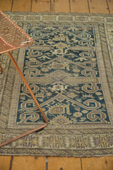 Antique Caucasian rug lower border with geometric crab motifs and subtle ribbon patterns.