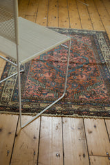 Finely woven vintage Tajabad rug featuring blush, brilliant sky blue, and abrashed green colors.