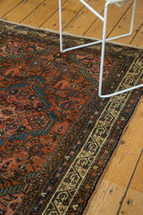 Finely woven border detail of the Tajabad rug with antique ivory, sand, and copper green patterns.