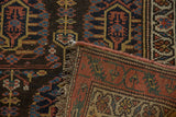 Antique Northwest Persian rug's secured woven edge, madder root red foundation, and dark pile.