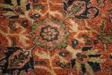 Vintage Mahalati rug detail: hand-knotted terra cotta field with green, blue palmettes and even wear.