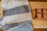 Loomination handwoven black and cream striped cotton dish towel.