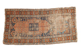 Antique Kurdish runner, asymmetric field, oblong and diamond medallions, coffee, indigo, terra cotta, ivory.