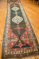 Vintage Kurdish Bijar runner corner, with brick red geometric borders and slate blue field.