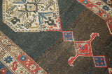 Kurdish Bijar rug showcasing abrashed field, brick red samovar motif, and ivory medallion.