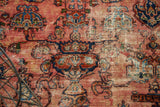 Antique Lilihan carpet: intricate curvilinear motifs, raspberry and sapphire abrash, visible foundation.