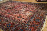 Antique Lilihan carpet corner with detailed vinery, botehs, raspberry, and sapphire abrashes.