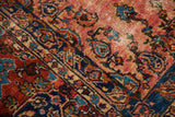Lilihan carpet's raspberry, sapphire, and ivory floral motifs with recessed pile revealing foundation.
