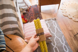 Pair of rope design beeswax taper candles, bamboo green, 10 inches.