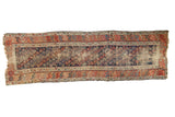 Antique Kurdish Hamadan runner with indigo boteh field, madder red borders, and aged patina.