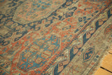 Intricate geometric patterns with even wear and exposed foundation on this antique Caucasian Soumac.