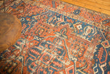 Rectilinear pattern detail of antique Karaja rug, sky blue, brick red, and ivory, with foundation wear.