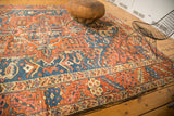 Antique Karaja carpet corner shows rectilinear border, tattered edge, and original selvage.