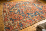 Antique Karaja corner detail: rectilinear border in brick red, sky blue, ivory, aged fringe.