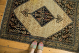 Antique Malayer Serab rug: navy diamond Herati medallion, beige field, rams horn motif.