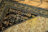 Highlighter stain on antique Malayer Serab rug's pale field and dark blue border.