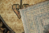 Antique Malayer Serab rug's folded corner, showing beige pile and bright woven reverse.