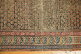 Geometric borders and worn field of antique Caucasian Soumac runner in teal, orange, mauve.