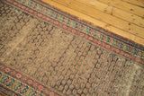 Antique Caucasian Soumac runner with repeating shrub design, geometric border, and visible foundation.
