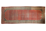 Antique Malayer rug runner, allover blush red boteh, serrated navy and ivory borders, time-softened tones.
