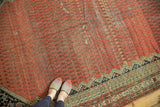 Corner view of antique Persian Malayer runner, blush red allover boteh, navy geometric border, rich patina.