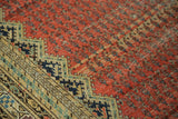 Antique Malayer runner, serrated border details in navy, celadon, with blush red field.
