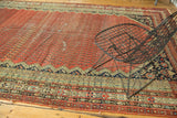 Antique Malayer runner's blush red boteh field, navy border with turtle motifs and aged patina.
