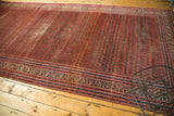 Antique Persian Malayer runner with intricate, rainbow-like shrub boteh design in brick red, sky blue.