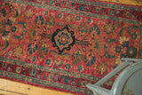 Raspberry red vintage Lilihan runner field, blue floral palmettes, and detailed border.