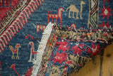 Hand-woven reverse, white fringe, and visible tatter on a vintage Soumac runner.