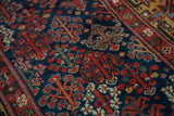 Intricate Garden of Paradise motif with red diamond trees on an antique Kurdish runner.