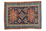 Antique Karaja rug with navy, madder red, sky blue diamond medallion and geometric floral field, 3x4.