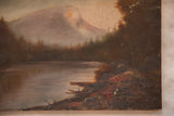 Aged texture of brown and red shoreline, with calm reflective water.
