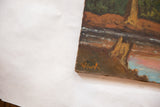 Artist's signature on vintage landscape painting with visible impasto texture.