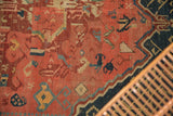 Unusual Armenian Seichor Kuba corner, rich madder red field and dark navy border.