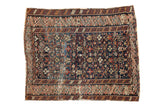 Antique Caucasian square rug, intricate allover geometric motifs in deep blue, madder red, gold.
