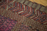 Geometric crab style borders, serrated patterns in madder root red, navy, and blush.