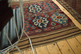 Fringed end of a vintage Shahsavan Kilim rug, showing striped flatweave.
