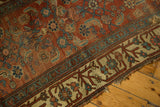 Antique Kurdish Bijar rug corner, showing heavy side tatter and worn Herati motifs.
