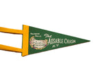 Close-up of green felt pennant with 'Rainbow Falls The Ausable Chasm N.Y.' text.