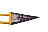 Vintage felt pennant showing lightly colored Zorayda Castle, palm trees, and yellow border.