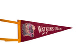 Close-up of vintage felt pennant with Native American headdress graphic and yellow trim.